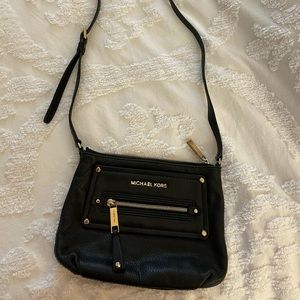 Michael kors black and gold cross body